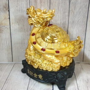 Thần long quy vàng mai điểm hồng ngọc