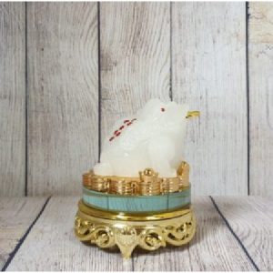 Thiềm thừ bạch đế trên tiền vàng đế thuỷ tinh xoay